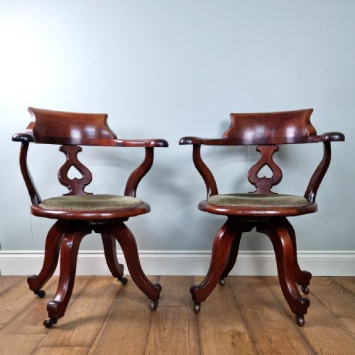 PAIR OF ANTIQUE DESK CHAIRS BY GEORGE BARTHOLOMEW CO