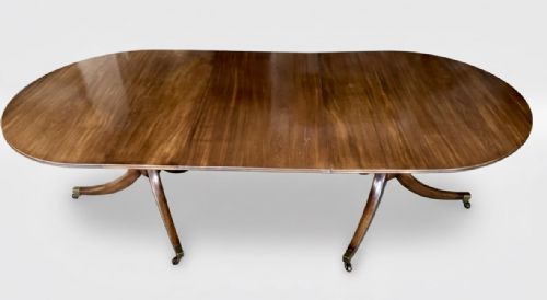 FINE QUALITY 19TH CENTURY FIGURED MAHOGANY REGENCY DESIGN TWIN PILLAR DINING TABLE