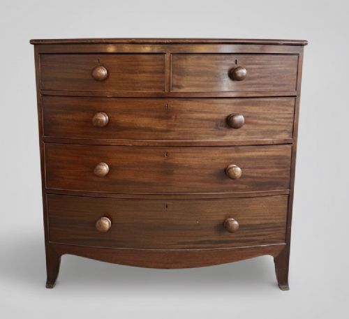 EARLY 19TH CENTURY MAHOGANY BOW FRONT CHEST OF DRAWERS