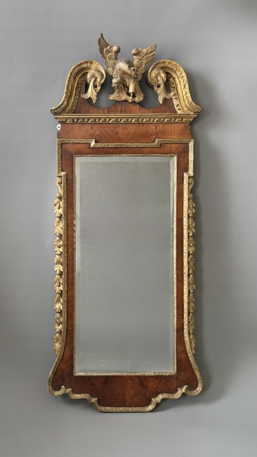 GEORGE III PARCEL GILT AND WALNUT MIRROR